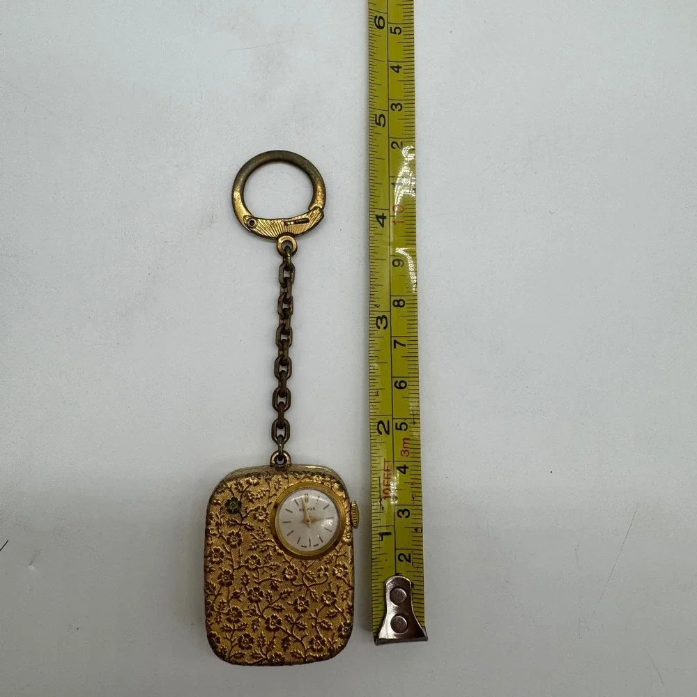 Vintage Reuge Swiss‎ Musical Pocket Watch Keychain Gold Tone Floral Embossed Fob